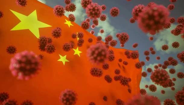 The Chinese flag waves in the background as 3D-rendered COVID-19 virus particles float in the foreground