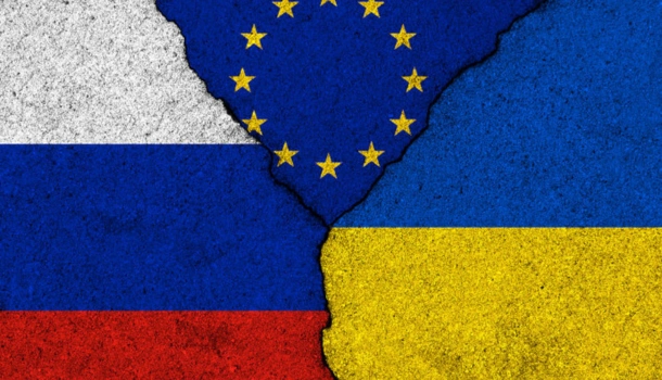 A cracked texture divides the flags of Russia, Ukraine, and the European Union