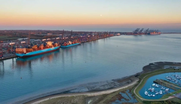 Aerial view of a busy UK port at sunset